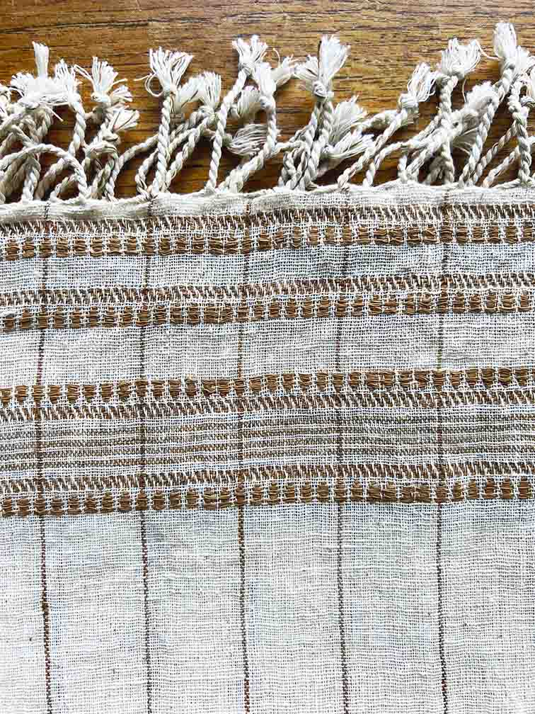 Set of four brown organic Kala cotton table napkins