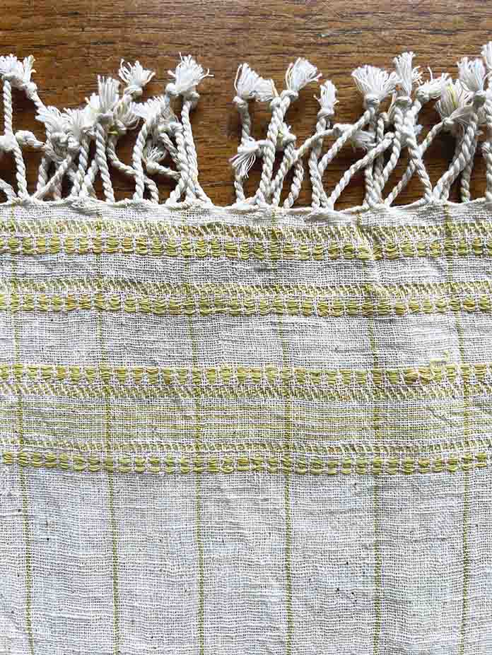 Set of four yellow organic Kala cotton table napkins